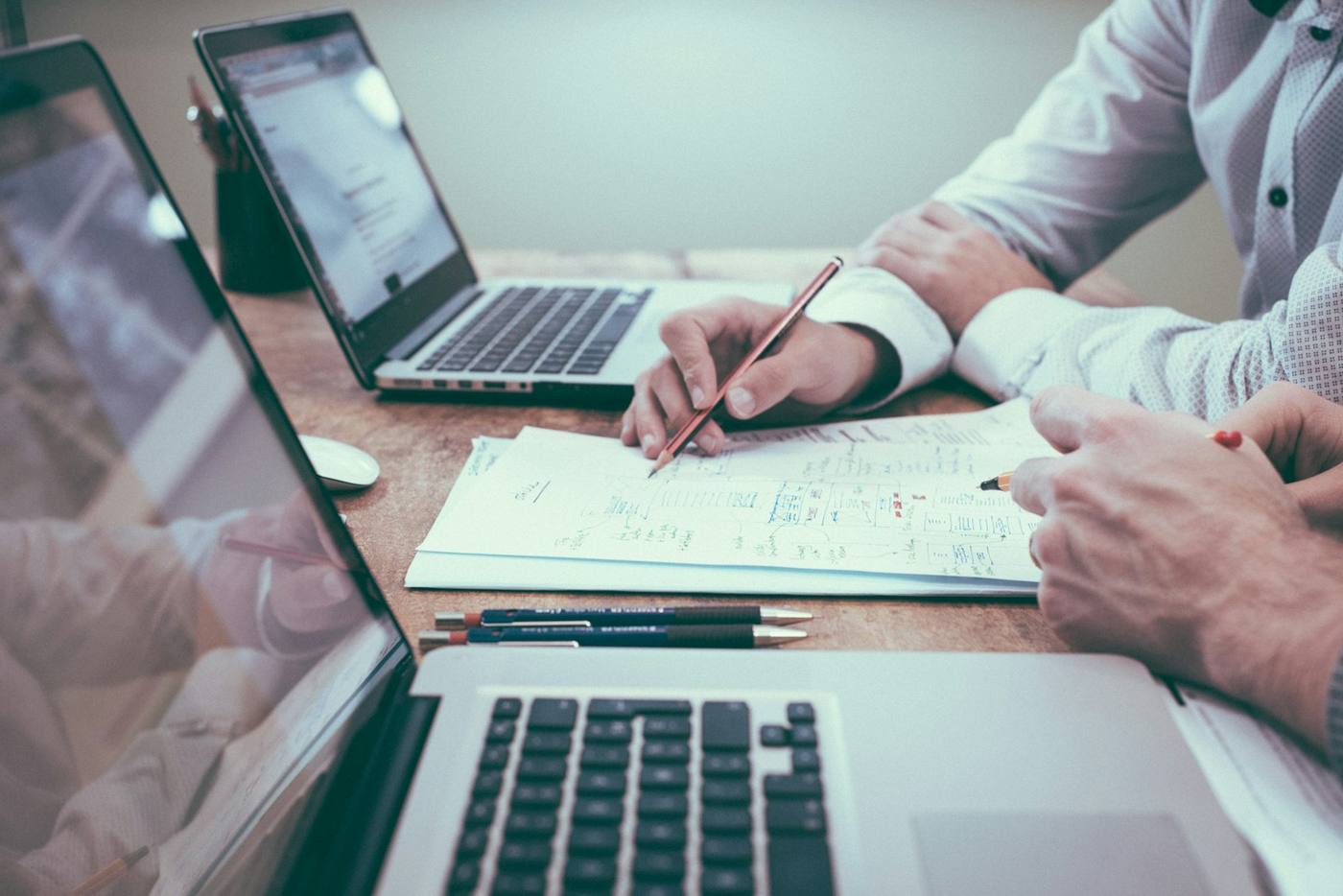Professionals reviewing documents in an office